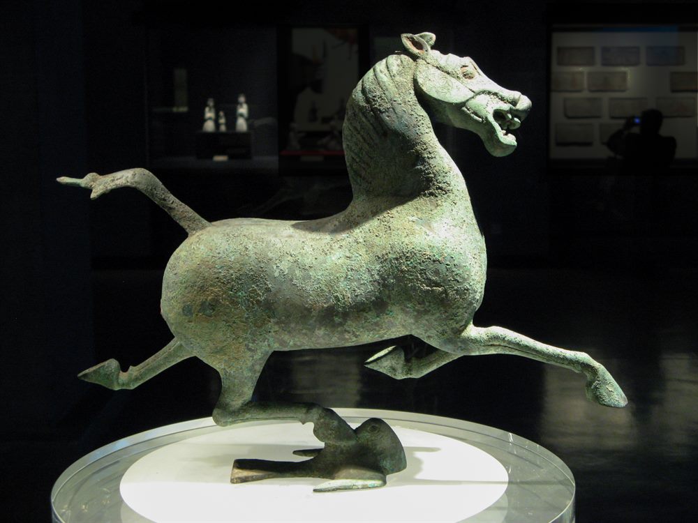 The Bronze Galloping Horse (Flying Horse of Gansu), an Eastern Han bronze of a horse balanced on one hoof atop a flying swallow, Gansu Provincial Museum
