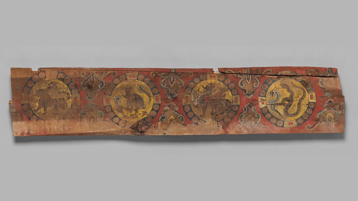 Long painted wooden panel showing Chinese zodiac animals, Central Asia, 8th–9th century.